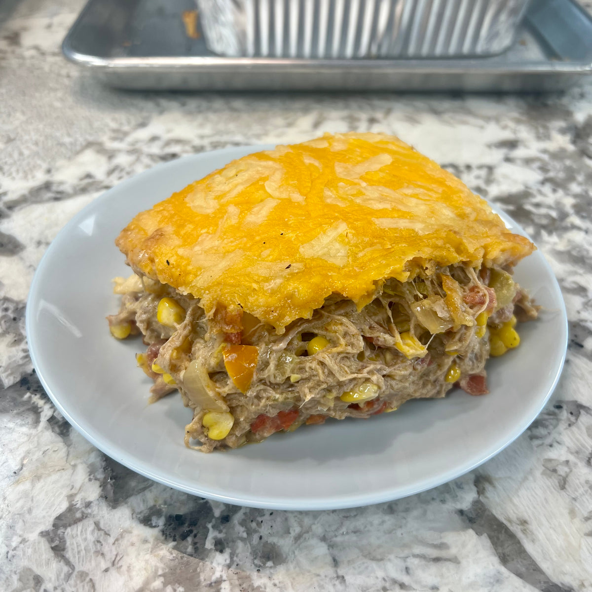 Bake at Home Pulled Pork Enchilada Bake